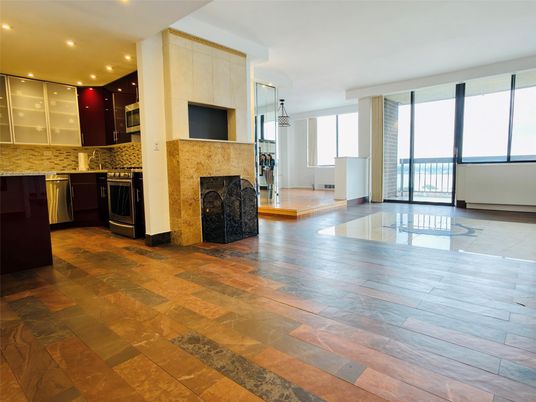 Empty room, Fireplace, Interior, Kitchen, Pendant Lights, Recessed Lighting, Wood Texture Flooring