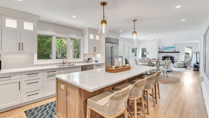 Dining room, Fireplace, Interior, Kitchen, Living room, Pendant Lights, Recessed Lighting, Stainless Steel Appliances, Wood Texture Flooring