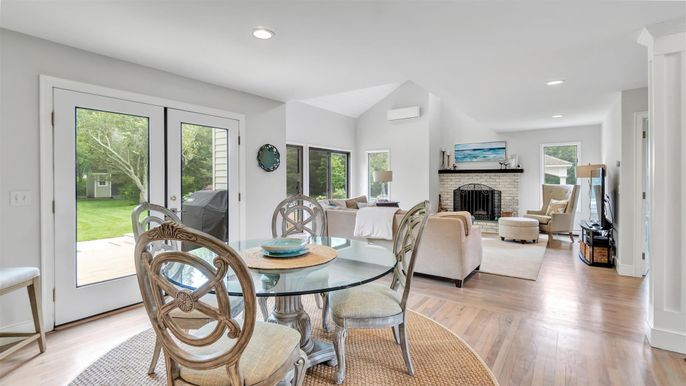 Dining room, Fireplace, Interior, Living room, Recessed Lighting, Wood Texture Flooring