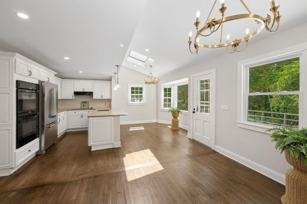 Chandelier, Interior, Kitchen, Pendant Lights, Recessed Lighting, Stainless Steel Appliances, Wood Texture Flooring
