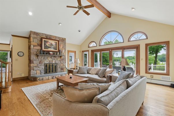 Fireplace, Interior, Living room, Recessed Lighting, Stone Walls, Wooden Beams, Wood Texture Flooring