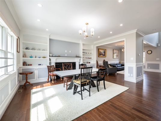 Chandelier, Dining room, Fireplace, Interior, Living room, Pendant Lights, Recessed Lighting, Wood Texture Flooring