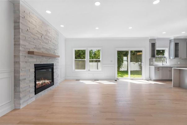 Empty room, Fireplace, Interior, Kitchen, Recessed Lighting, Wood Texture Flooring