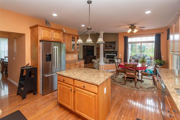 Dining room, Fireplace, Interior, Kitchen, Pendant Lights, Recessed Lighting, Wood Texture Flooring