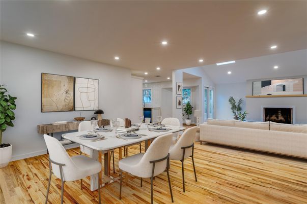 Dining room, Fireplace, Interior, Living room, Recessed Lighting, Wood Texture Flooring