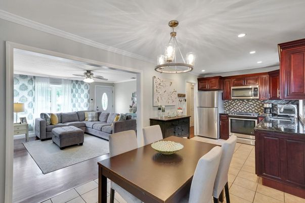 Dining room, Interior, Kitchen, Living room, Pendant Lights, Recessed Lighting, Stainless Steel Appliances, Wood Texture Flooring