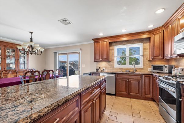 Chandelier, Dining room, Interior, Kitchen, Recessed Lighting, Stainless Steel Appliances
