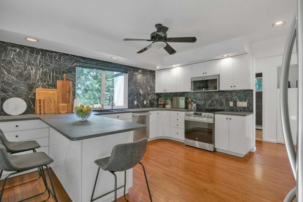 Interior, Kitchen, Recessed Lighting, Stainless Steel Appliances, Wood Texture Flooring