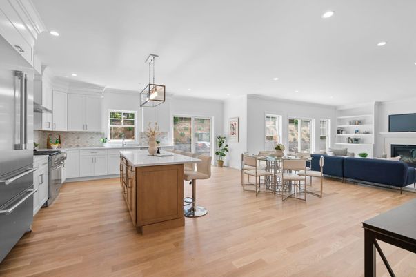 Dining room, Fireplace, Interior, Kitchen, Living room, Pendant Lights, Recessed Lighting, Stainless Steel Appliances, Wood Texture Flooring