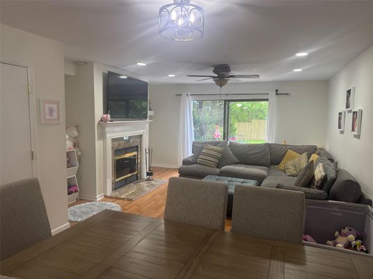 Fireplace, Interior, Living room, Recessed Lighting, Wood Texture Flooring