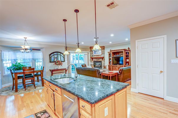 Dining room, Fireplace, Interior, Kitchen, Pendant Lights, Recessed Lighting, Wood Texture Flooring