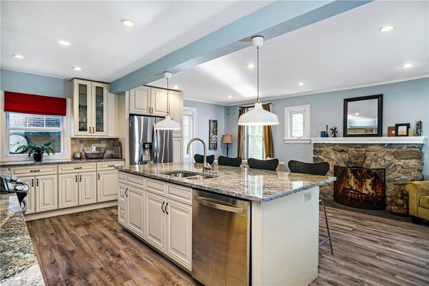 Fireplace, Interior, Kitchen, Pendant Lights, Recessed Lighting, Stainless Steel Appliances, Wood Texture Flooring