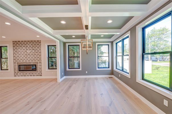 Empty room, Fireplace, Interior, Recessed Lighting, Stone Walls, Wood Texture Flooring