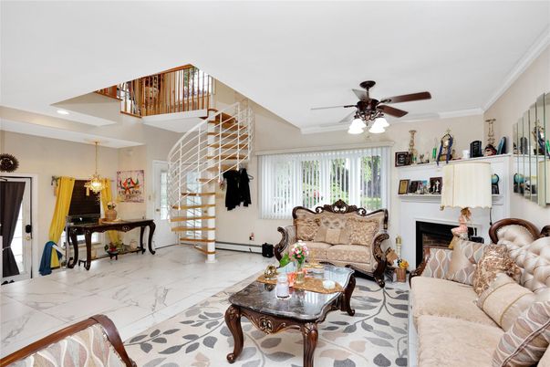 Chandelier, Fireplace, Interior, Living room, Marble, Recessed Lighting