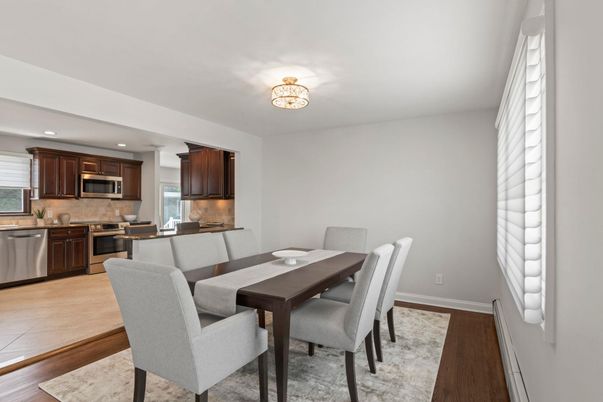 Dining room, Interior, Kitchen, Recessed Lighting, Stainless Steel Appliances, Wood Texture Flooring