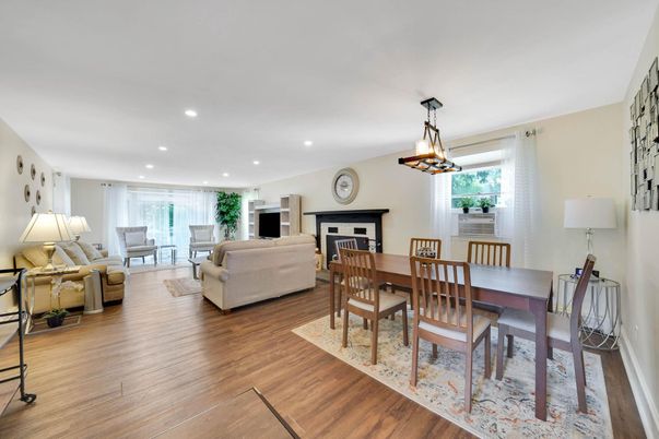 Dining room, Fireplace, Interior, Living room, Pendant Lights, Recessed Lighting, Wood Texture Flooring