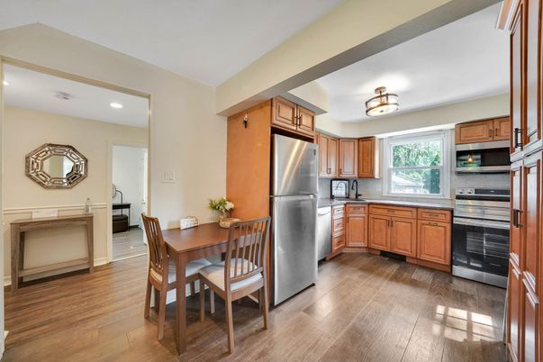 Dining room, Interior, Kitchen, Recessed Lighting, Stainless Steel Appliances, Wood Texture Flooring
