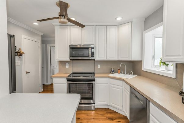 Interior, Kitchen, Recessed Lighting, Stainless Steel Appliances, Wood Texture Flooring
