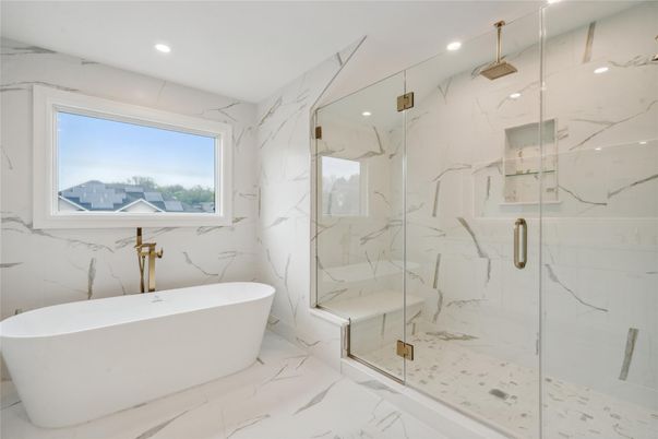 Bathroom, Free Standing Baths, Glass Shower, Interior, Marble, Marble Walls, Recessed Lighting