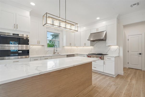Interior, Kitchen, Pendant Lights, Recessed Lighting, Stainless Steel Appliances, Wood Texture Flooring