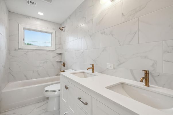 Bathroom, Dual Sink Vanities, Interior, Marble, Marble Walls, Recessed Lighting