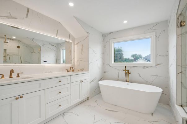 Bathroom, Dual Sink Vanities, Free Standing Baths, Interior, Marble, Marble Walls, Recessed Lighting