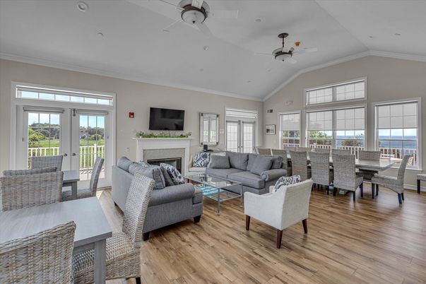 Dining room, Fireplace, Interior, Living room, Recessed Lighting, Water, Wood Texture Flooring