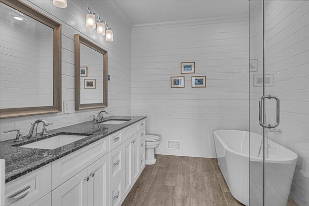 Bathroom, Dual Sink Vanities, Free Standing Baths, Interior, Wood Texture Flooring