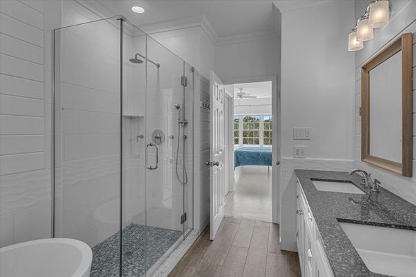Bathroom, Dual Sink Vanities, Glass Shower, Interior, Recessed Lighting, Wood Texture Flooring