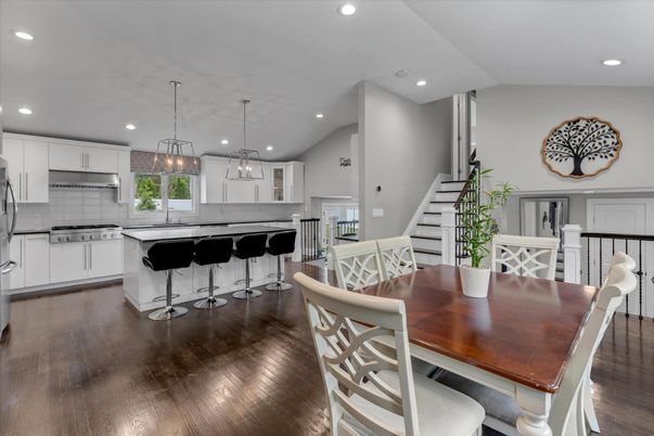 Dining room, Interior, Kitchen, Pendant Lights, Recessed Lighting, Stainless Steel Appliances, Wood Texture Flooring