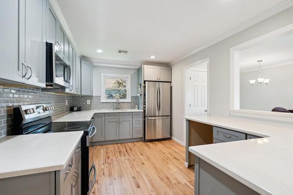 Chandelier, Interior, Kitchen, Recessed Lighting, Stainless Steel Appliances, Wood Texture Flooring