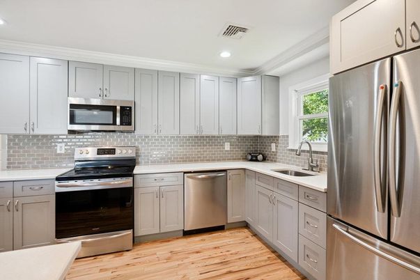 Interior, Kitchen, Recessed Lighting, Stainless Steel Appliances, Wood Texture Flooring