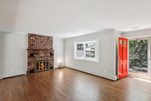 Empty room, Fireplace, Interior, Recessed Lighting, Stone Walls, Wood Texture Flooring