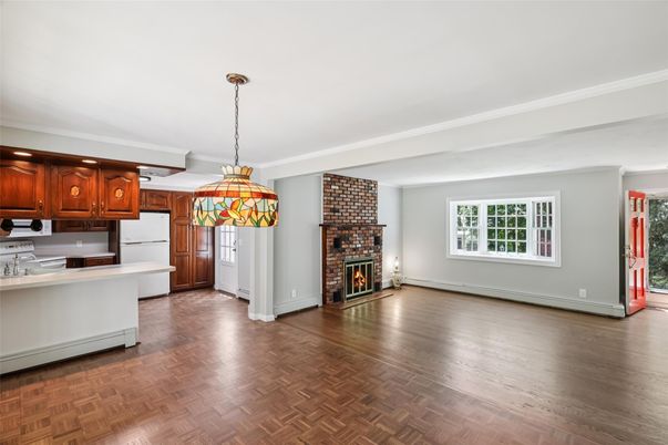 Empty room, Fireplace, Interior, Kitchen, Pendant Lights, Wood Texture Flooring