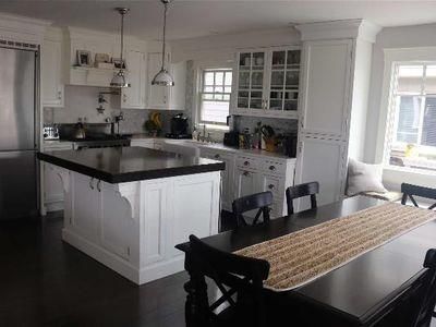 Dining room, Interior, Kitchen, Pendant Lights, Stainless Steel Appliances, Wood Texture Flooring