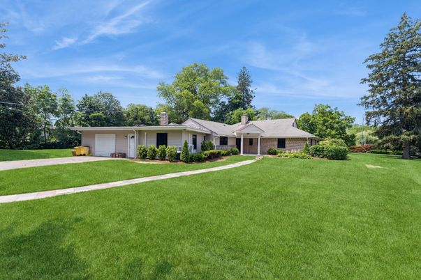 Attached, Backyard, Exterior, Facade, Brick Facade, Ranch