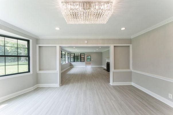 Chandelier, Empty room, Fireplace, Interior, Recessed Lighting, Wood Texture Flooring