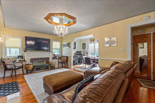 Chandelier, Dining room, Fireplace, Interior, Living room, Wood Texture Flooring
