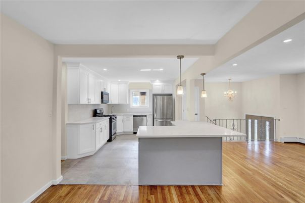 Chandelier, Interior, Kitchen, Pendant Lights, Recessed Lighting, Stainless Steel Appliances, Wood Texture Flooring