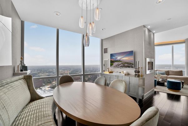 Dining room, Fireplace, Interior, Living room, Pendant Lights, Recessed Lighting, Water, Wood Texture Flooring