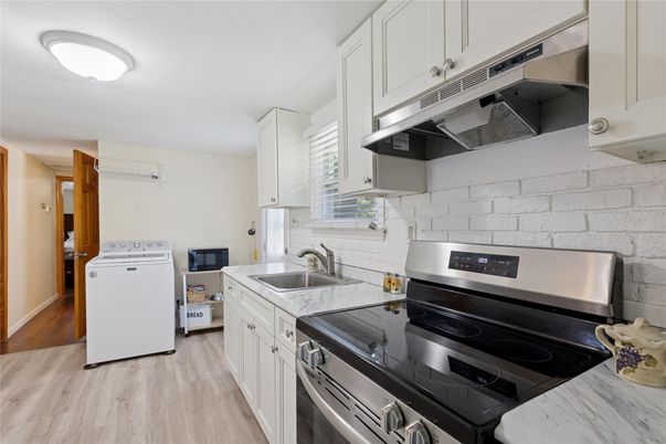 Interior, Kitchen, Stainless Steel Appliances, Washer, Wood Texture Flooring