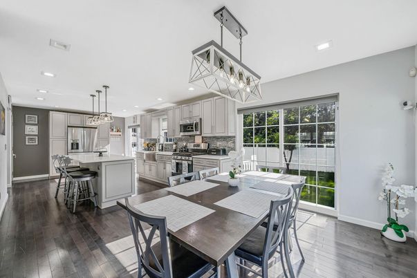 Dining room, Interior, Kitchen, Pendant Lights, Recessed Lighting, Stainless Steel Appliances, Wood Texture Flooring