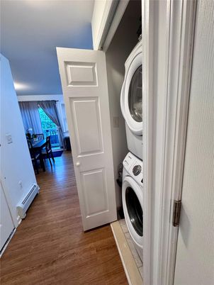 Dining room, Interior, Utility Closets, Washer, Wood Texture Flooring