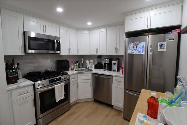 Interior, Kitchen, Recessed Lighting, Stainless Steel Appliances, Wood Texture Flooring
