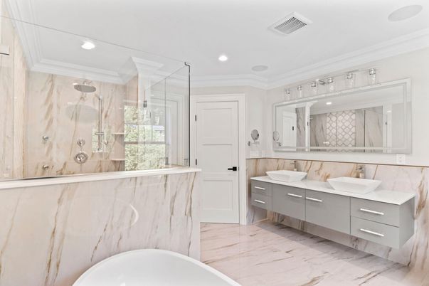 Bathroom, Dual Sink Vanities, Glass Shower, Interior, Marble, Marble Walls, Recessed Lighting