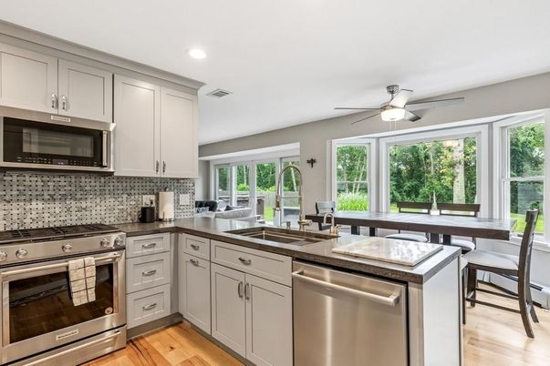 Dining room, Interior, Kitchen, Recessed Lighting, Stainless Steel Appliances, Wood Texture Flooring