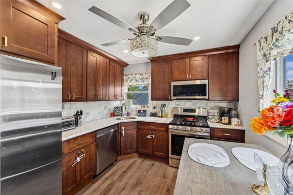 Interior, Kitchen, Recessed Lighting, Stainless Steel Appliances, Wood Texture Flooring