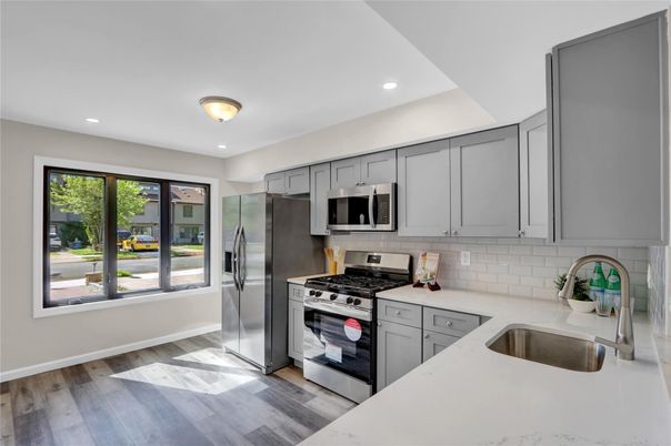 Interior, Kitchen, Recessed Lighting, Stainless Steel Appliances, Wood Texture Flooring
