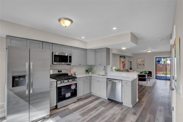 Interior, Kitchen, Recessed Lighting, Stainless Steel Appliances, Wood Texture Flooring