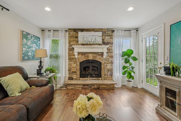 Fireplace, Interior, Living room, Recessed Lighting, Stone Walls, Wood Texture Flooring